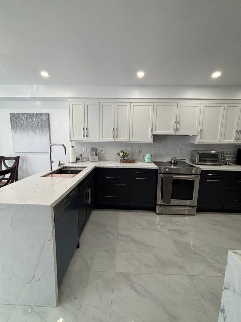 Kitchen Renovation North York with two-tone kitchen cabinets and waterfall countertops